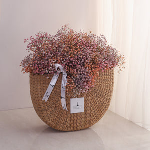 Burst of happiness in cane bag