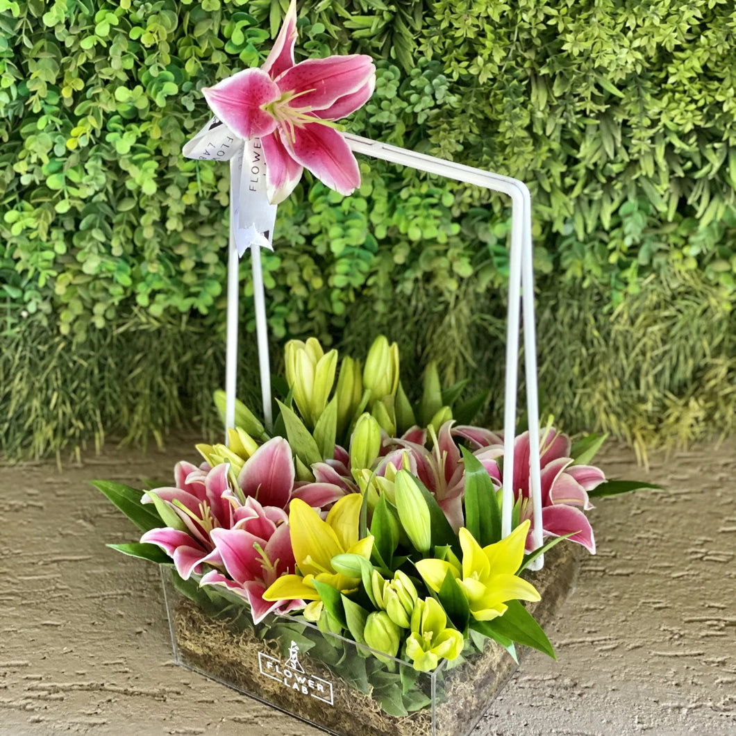 Lilies in an Acrylic Basket