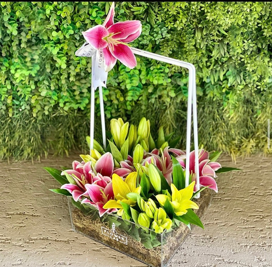 Lilies in an Acrylic Basket