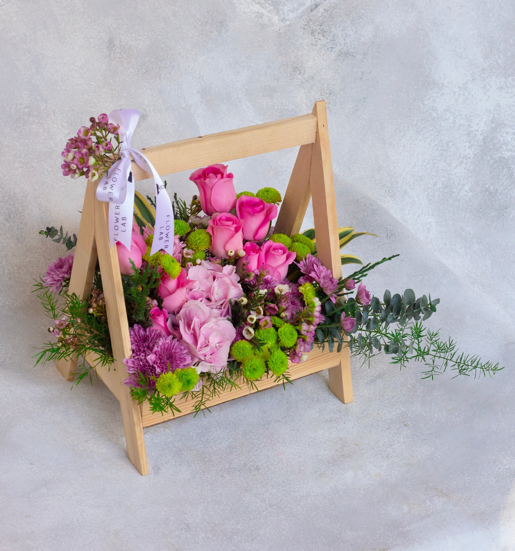 Mixed Wild Flowers in a Wooden Basket