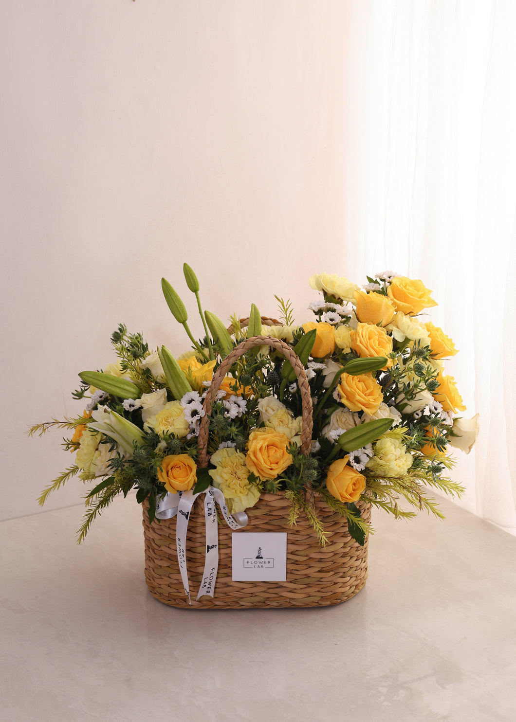Sunny Blooms in Cane Basket